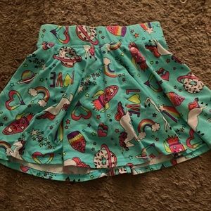 I am selling a blue skirt with unicorns